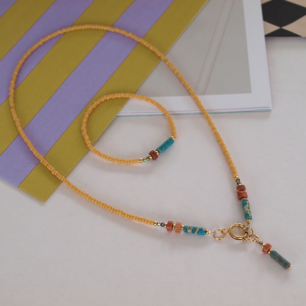 Widaro halflange ketting aqua touch of beige