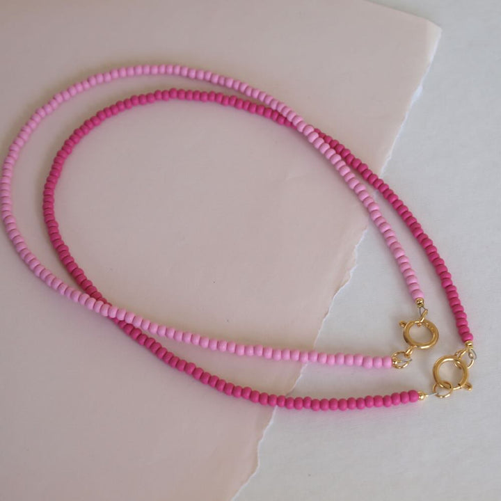 Widaro ketting mat fuchsia/pink beads (Goud/zilver)