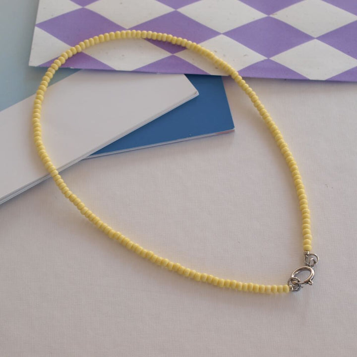 widaro ketting pastel yellow/ naturel glow (goud/zilver)
