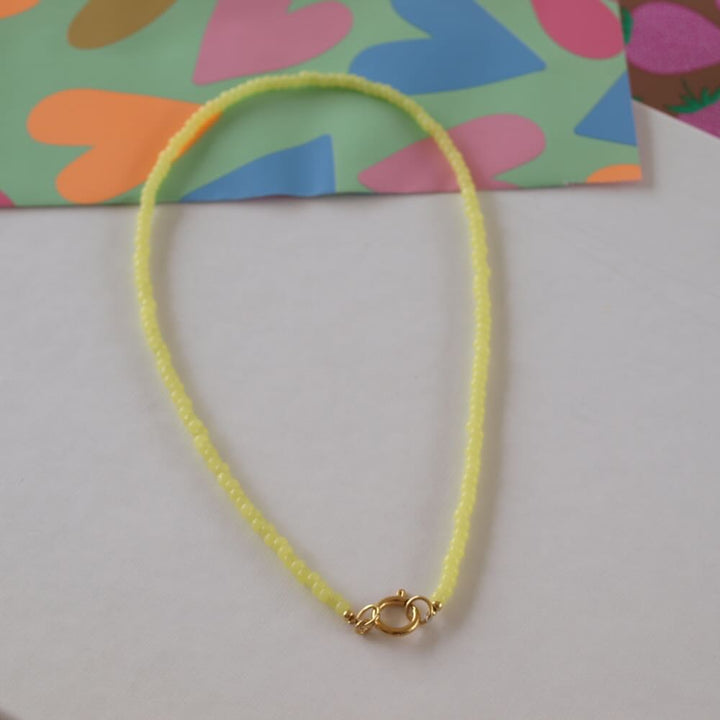 widaro ketting pastel yellow/lila beads (goud/zilver)
