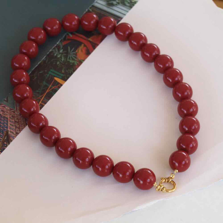widaro ketting big round wine red (kies je grootte)