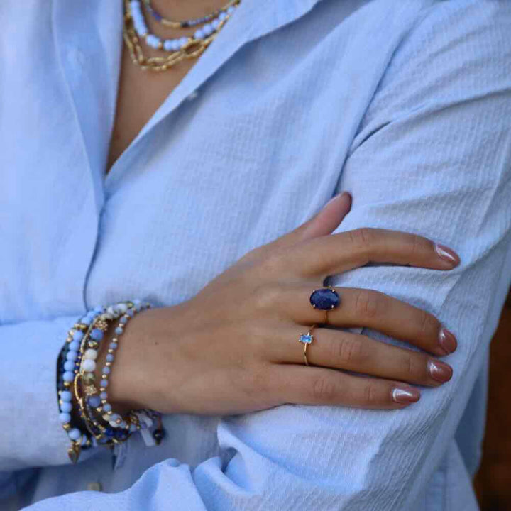 Une a Une ring Tini saphir