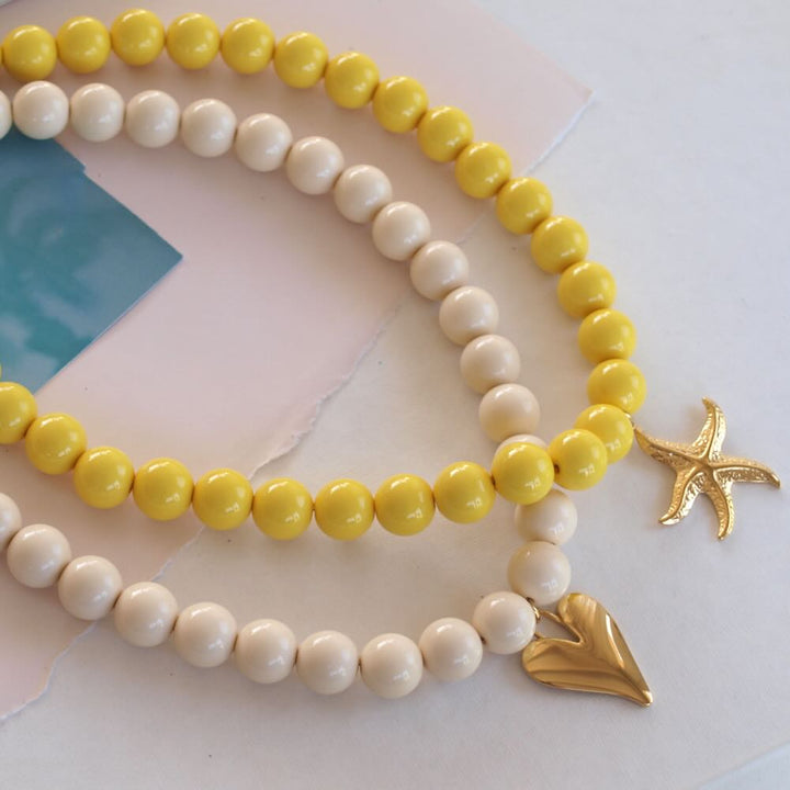 widaro ketting big round cream/yellow gold