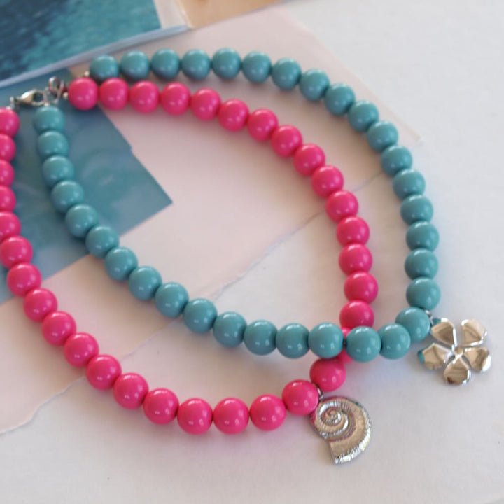 widaro ketting big round fuchsia/turquoise zilver