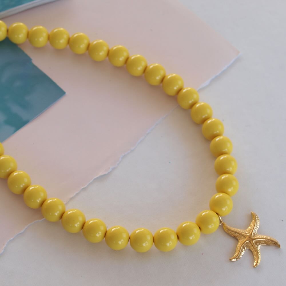 widaro ketting big round cream/yellow gold