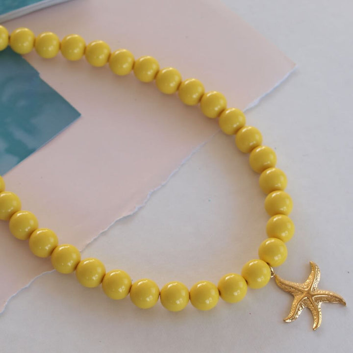 widaro ketting big round cream/yellow gold