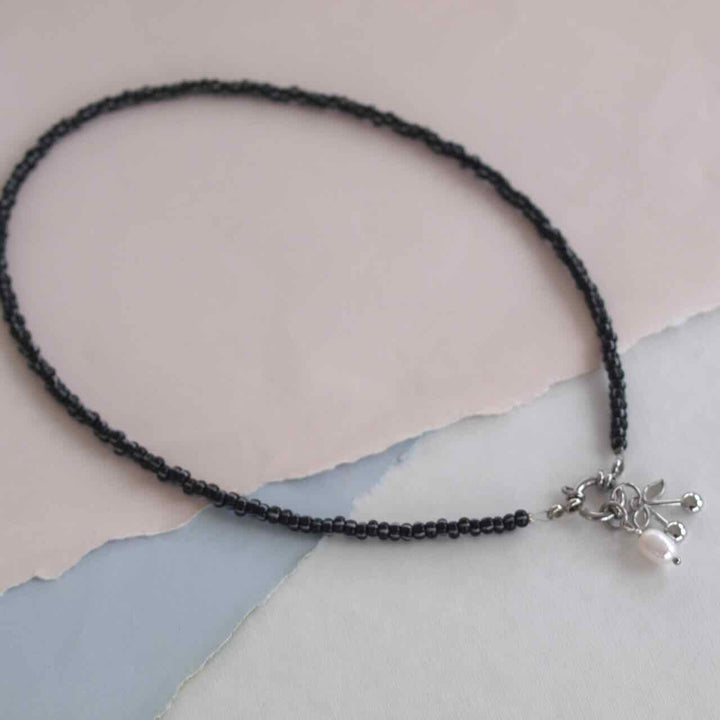 widaro ketting black white stripe beads (kies goud/zilver)