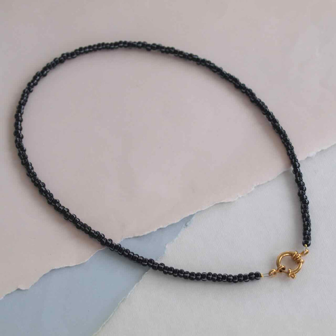 widaro ketting black white stripe beads (kies goud/zilver)