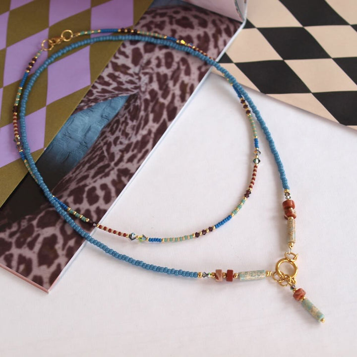 widaro halflange ketting blue touch of naturels