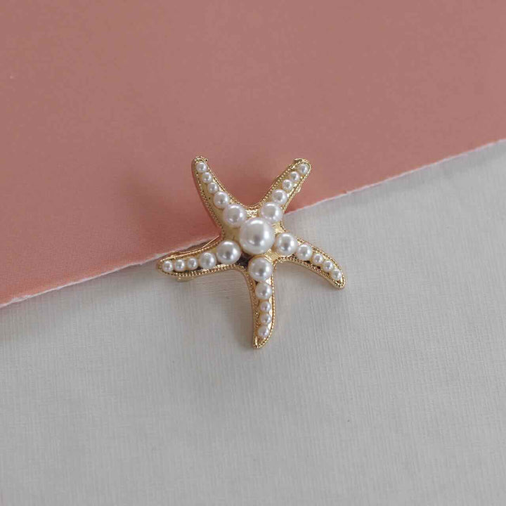 broche pearl sea star