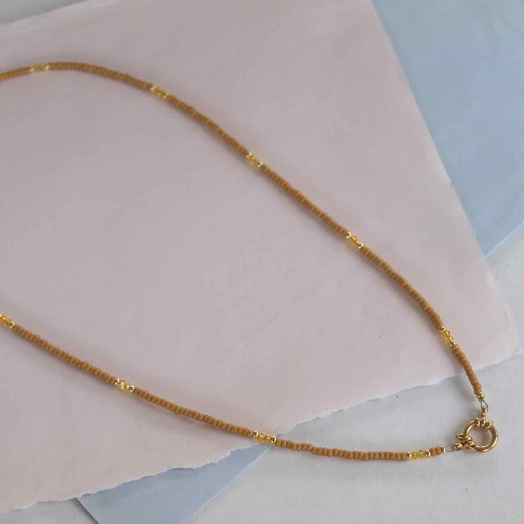 widaro lange ketting brown/orange 60 cm
