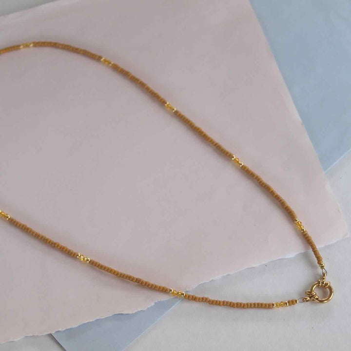 widaro lange ketting brown/orange 60 cm