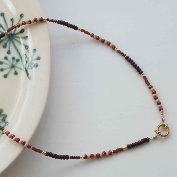widaro ketting brown tones