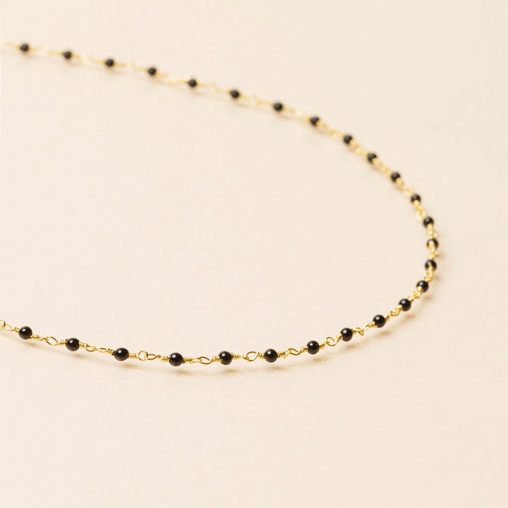 une a une ketting inde zwart
