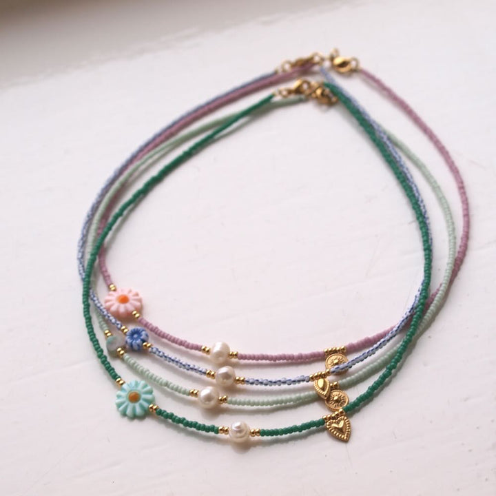 Widaro ketting pearl charm blue stripes
