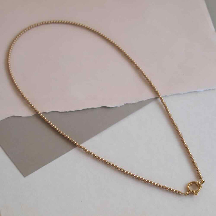 widaro halflange ketting pearl gold