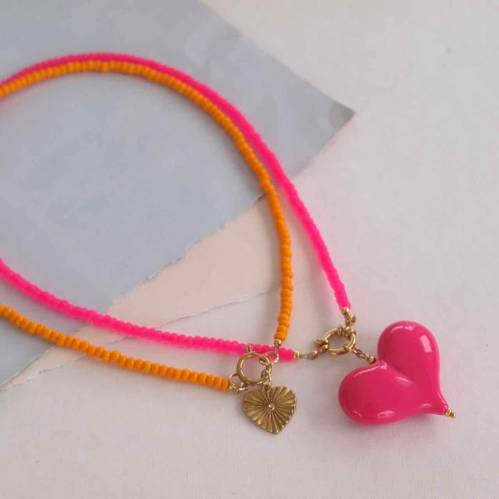 widaro ketting light orange/neon pink beads