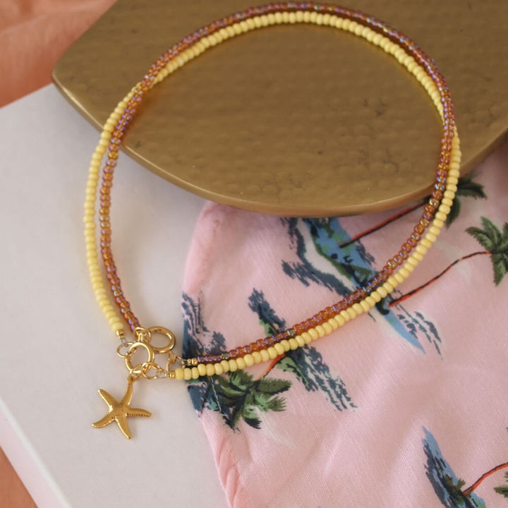 widaro ketting pastel yellow/ naturel glow (goud/zilver)