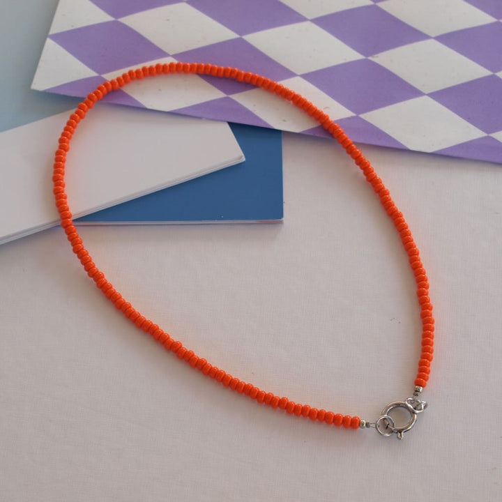 widaro ketting orange/red beads (goud/zilver)