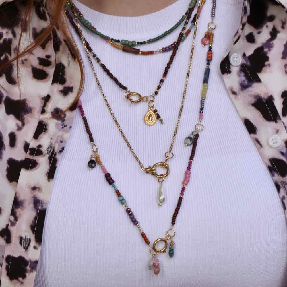 widaro ketting green purple tones