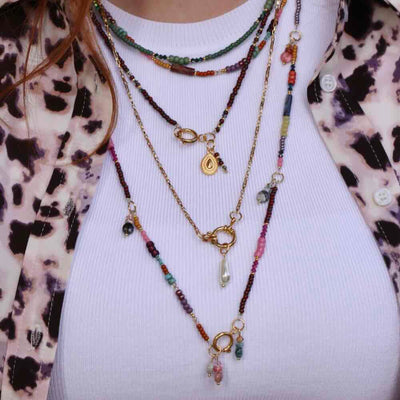 widaro ketting green purple tones